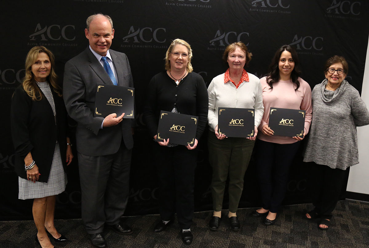 ACC Board recognizes staff members who volunteers for United Way tax program